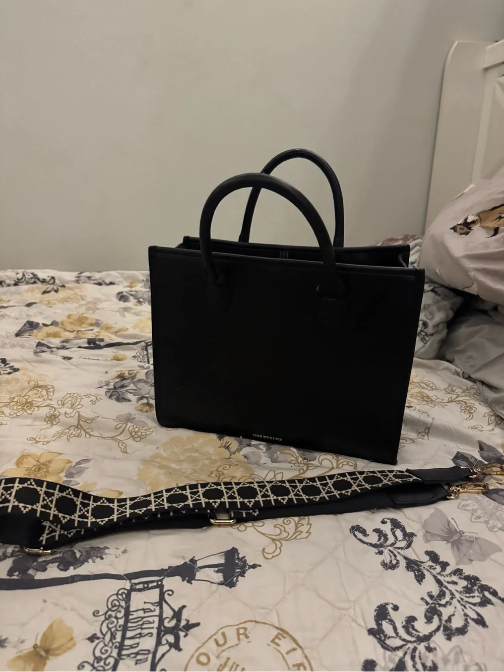 Classic Black Structured Satchel with Decorative Strap